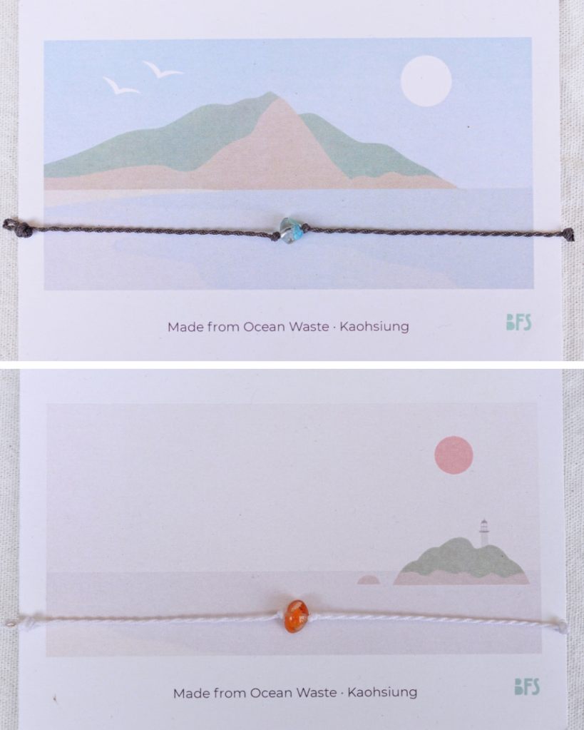 呼應「高雄山海共生」主題，以柴山與西子灣為發想的海廢拼貼明信片設計，畫面中搭配迷你寶石手繩。
